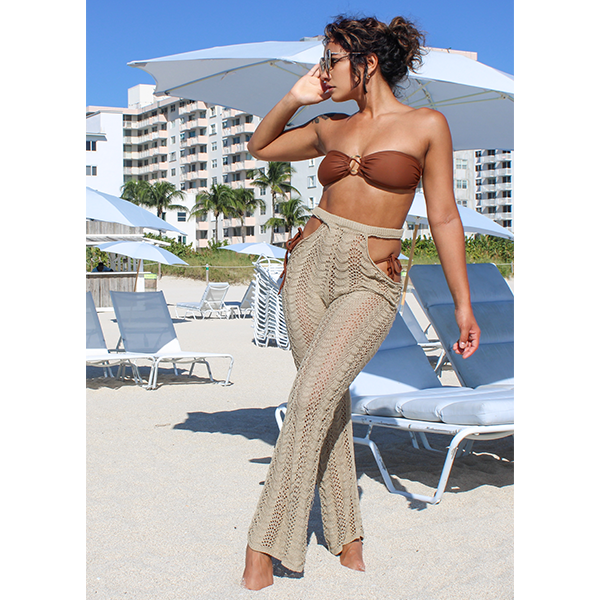 Beach cover up crochet pant made of 100% Polyester. This cover up pant is color Khaki. This pant has two opening in each side of the hip that make it looks attractive and is perfect for the beach.